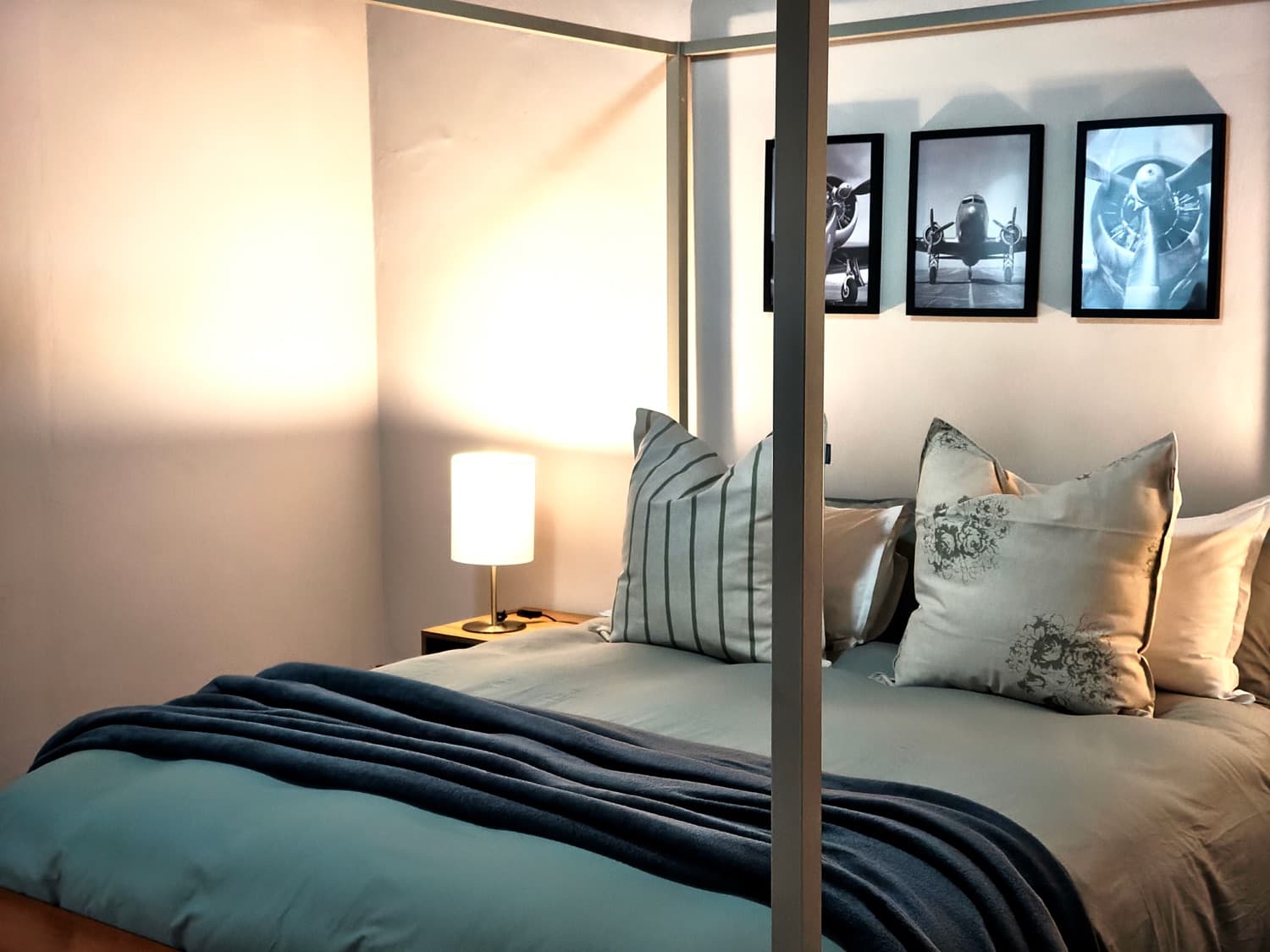 The Blackbox bed with vintage aviation art