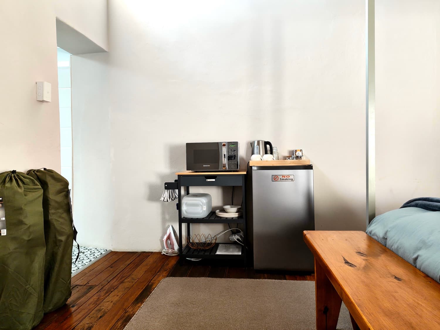 The Blackbox kitchenette with microwave and fridge